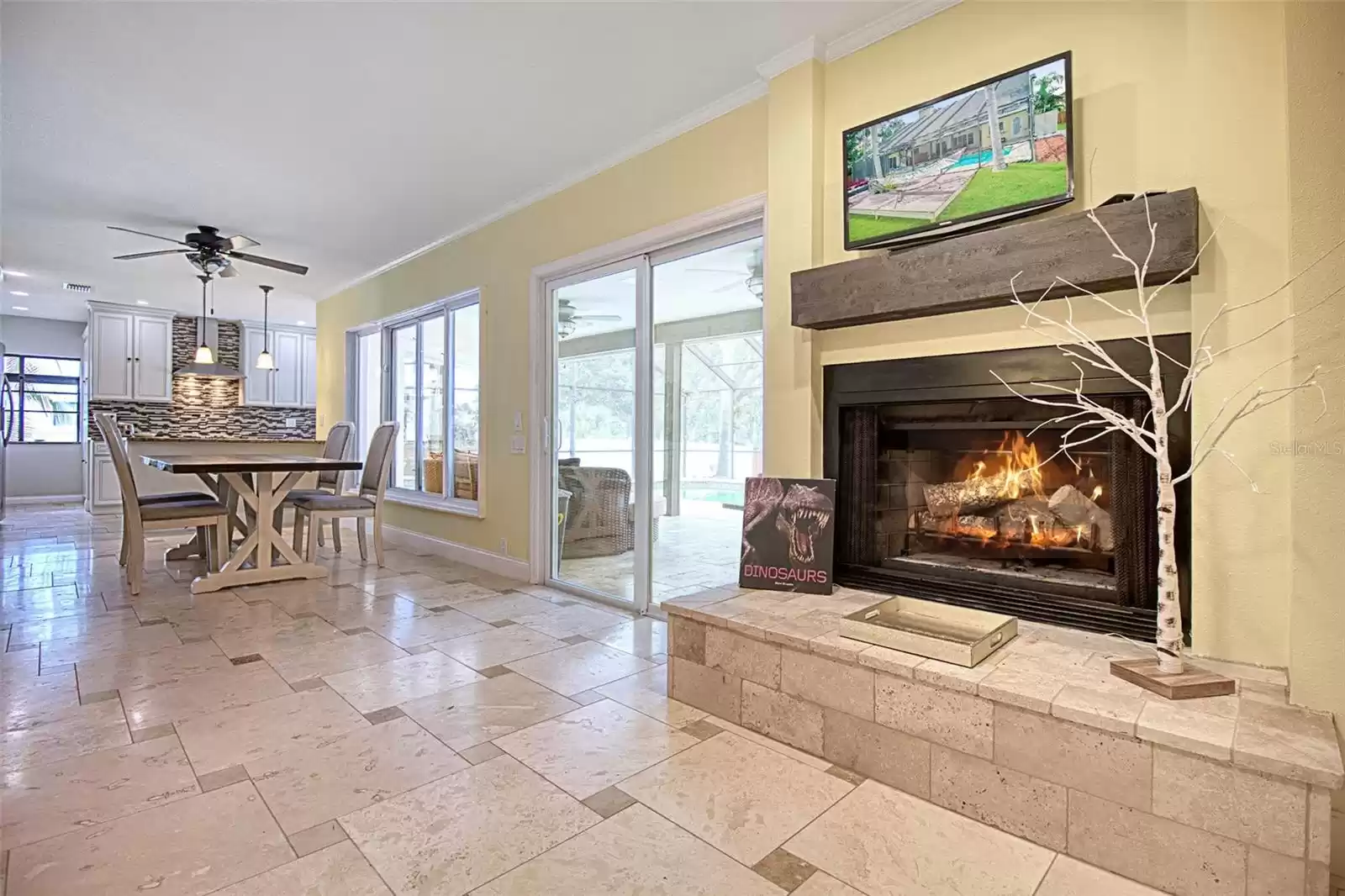 Majestic wood burning fireplace in the family room