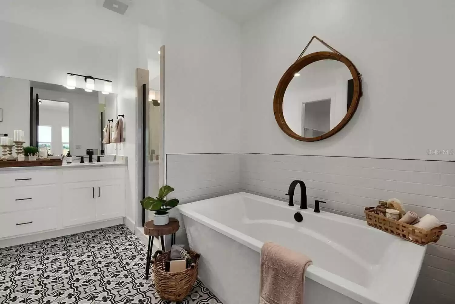 Master Bathroom.  Accessories shown are not included. Counter Tops, Flooring, Sinks, Tub, Mirrors, Fixtures and Shower Door may vary. All such details to be discussed and concluded at the Bulder Meeting.