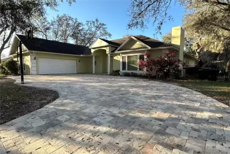 7133 WOODED VILLAGE LANE, ORLANDO, Florida 32835, 5 Bedrooms Bedrooms, ,3 BathroomsBathrooms,Residential Lease,For Rent,WOODED VILLAGE,MFRO6180763