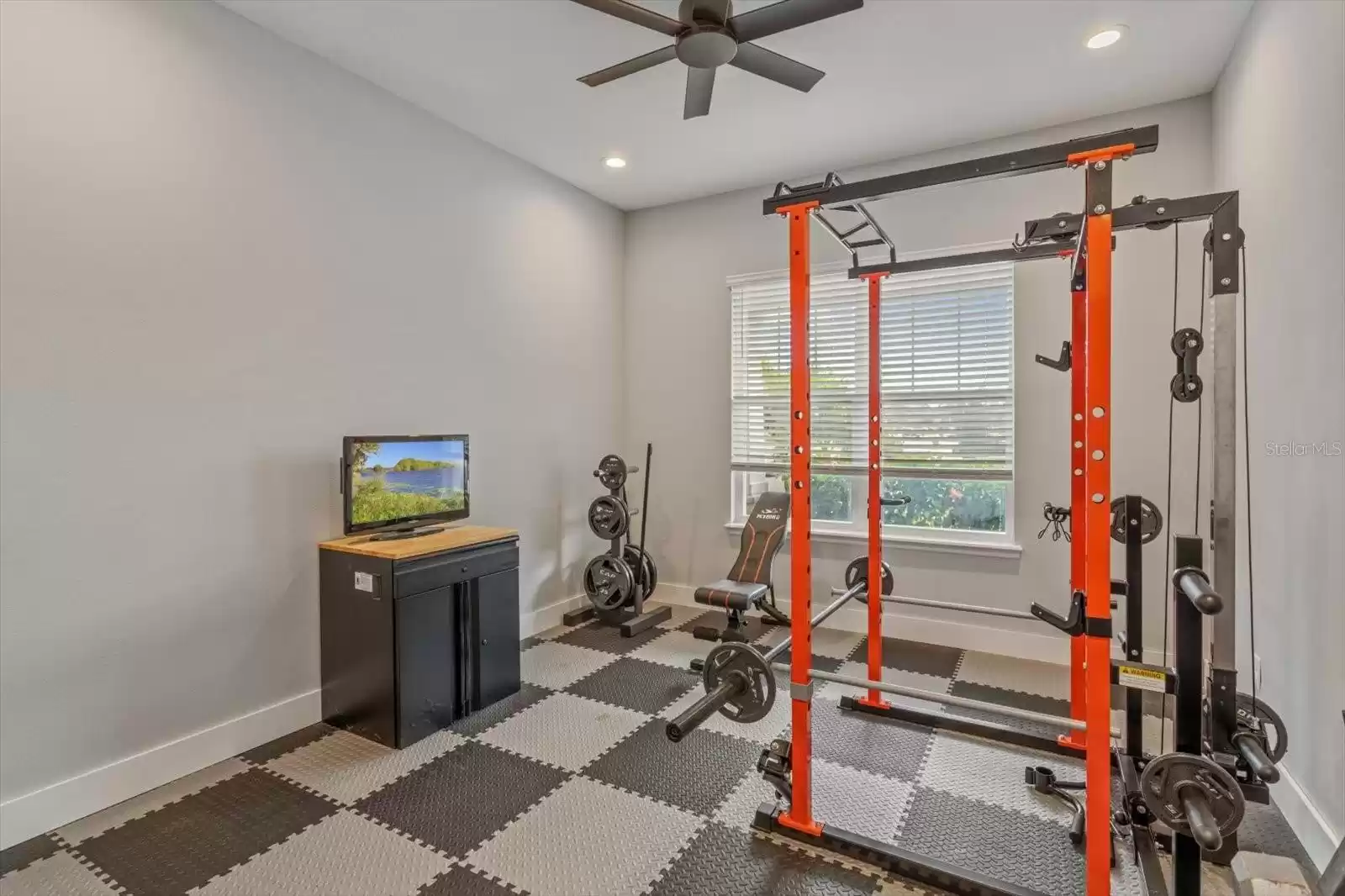 1st floor inlaw suite living room can double as an office (currently a home gym)