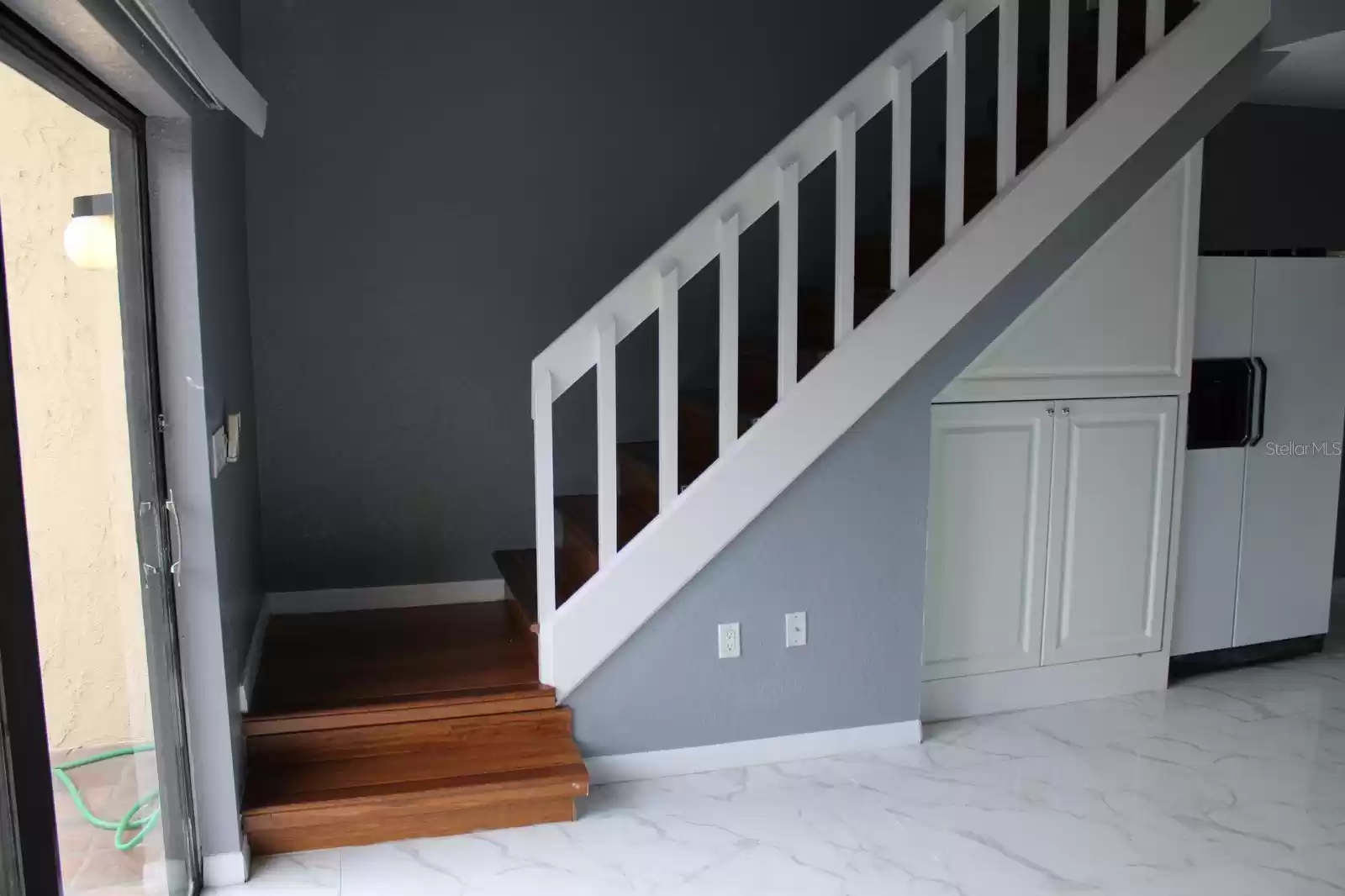 stairs to upstairs Bedroom