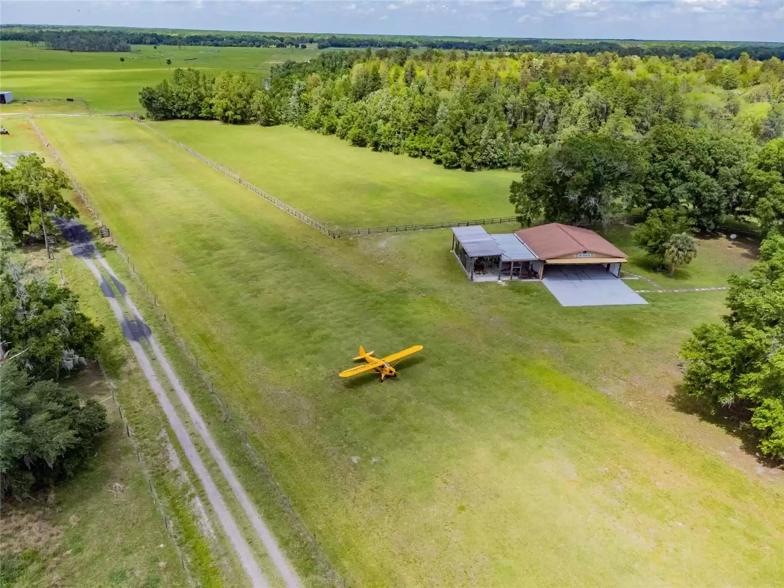 Serene and private location make this property a sought after retreat for pilots, aviation enthusiasts, and nature lovers alike.